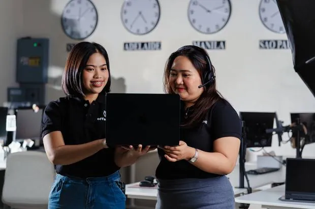 Offshored team members working with AI tools