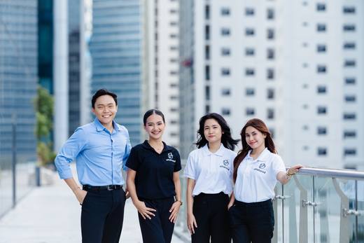 Offshored team members on the office rooftop