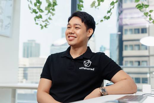 An Offshored team member at his desk
